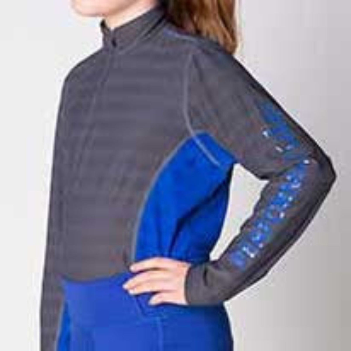 Grey riding shirt with blue side, zip and blue logo on sleeve.