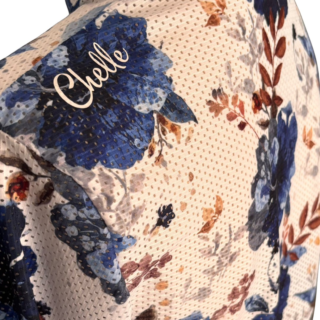 Australian made limited edition equestrian sun shirt in navy floral print worn with navy riding breeches