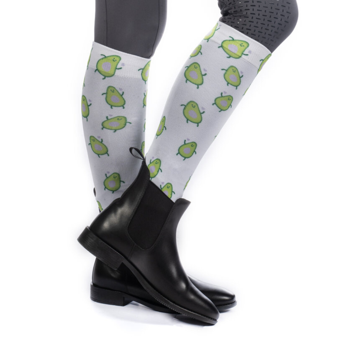 White horse riding socks with avocados