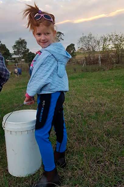 purple tights on girl riding horse